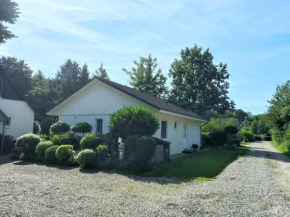 Ferienhaus Inger - stilvolles und modernes Ferienhaus mit Terrasse und Gartennutzung, Tarp